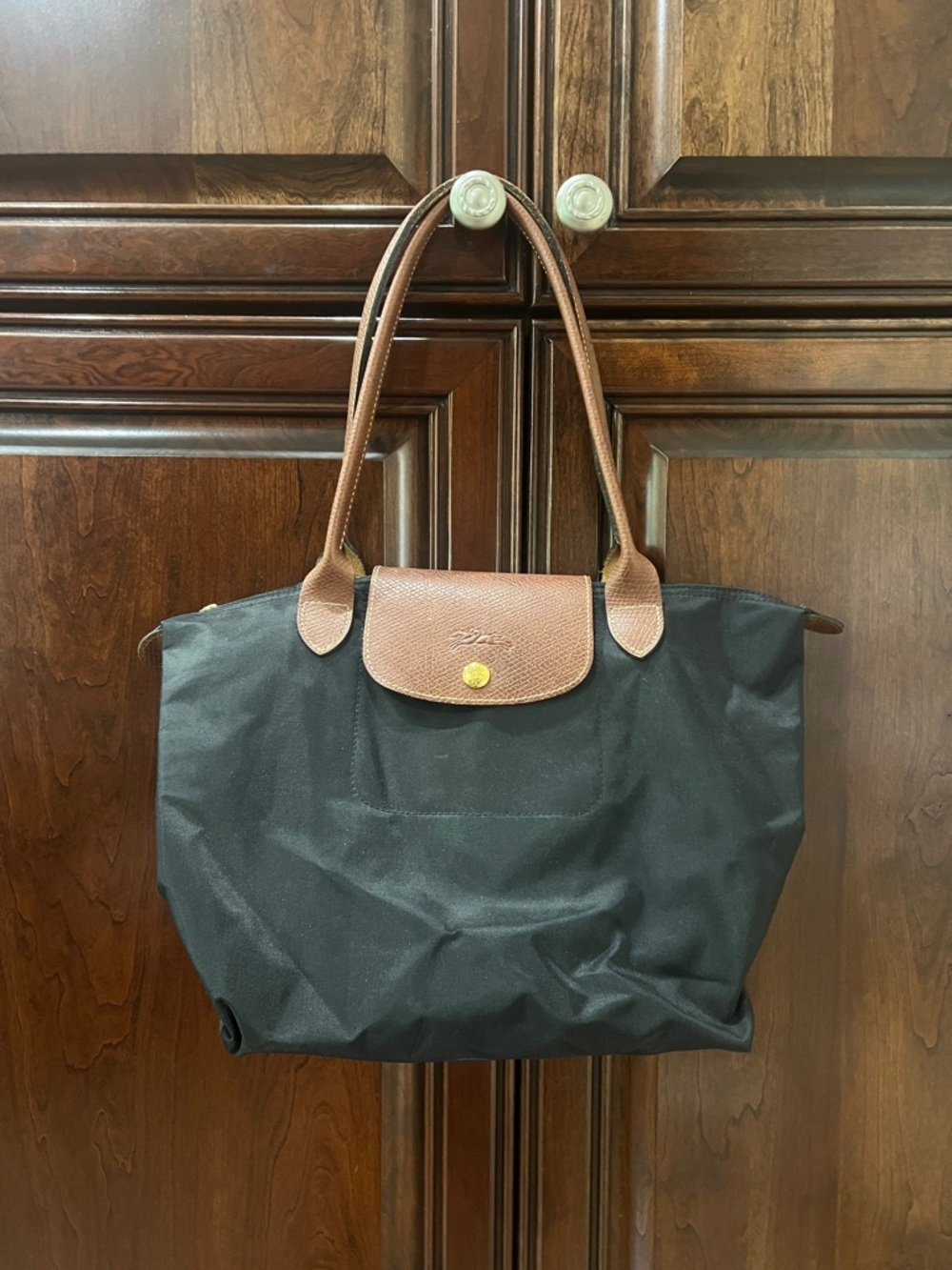 Longchamp Black Tote with Brown Trim and Handles